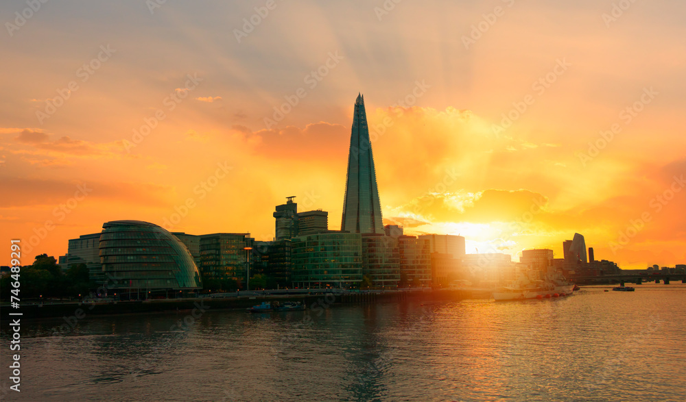 Skyline of London with Thames River at sunset - United Kingdom