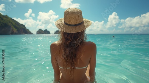 Seaside Serenity: Woman Enjoys Holiday on Beach, Viewed from Behind