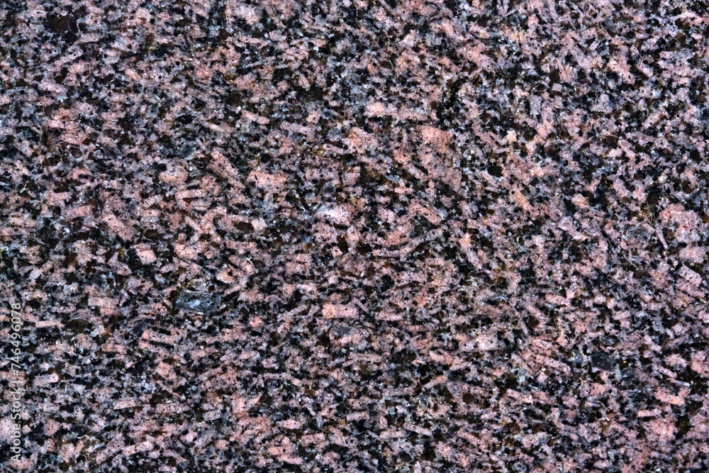 Granite Texture, Red Base with Black and Gray Spots. close up