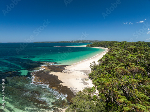 High angle aerial drone view of Huskisson Beach in Huskisson, a beachside suburb in Jervis Bay Territory on the South Coast of New South Wales, Australia. Popular tourism destination fpr Sydneysiders.