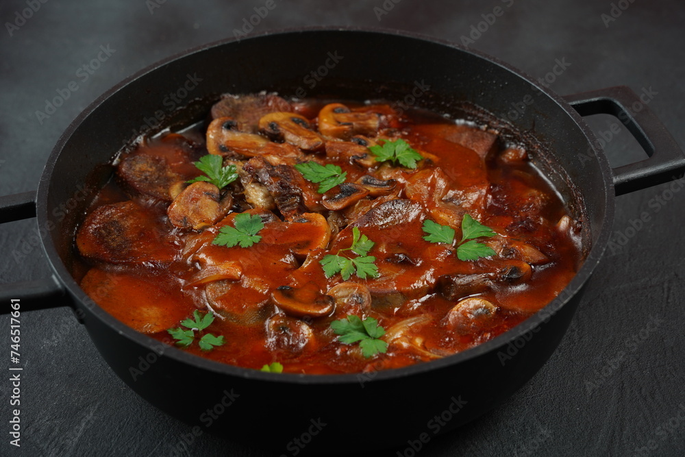 Slowly stewed beef tongue with mushrooms and onions
