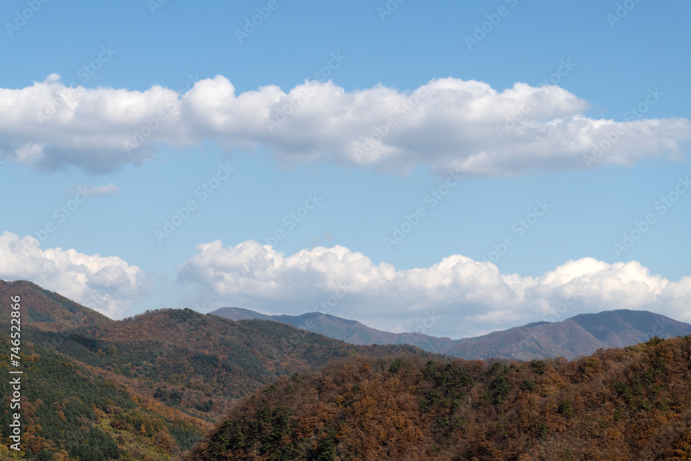 White clouds on the autumn mountains