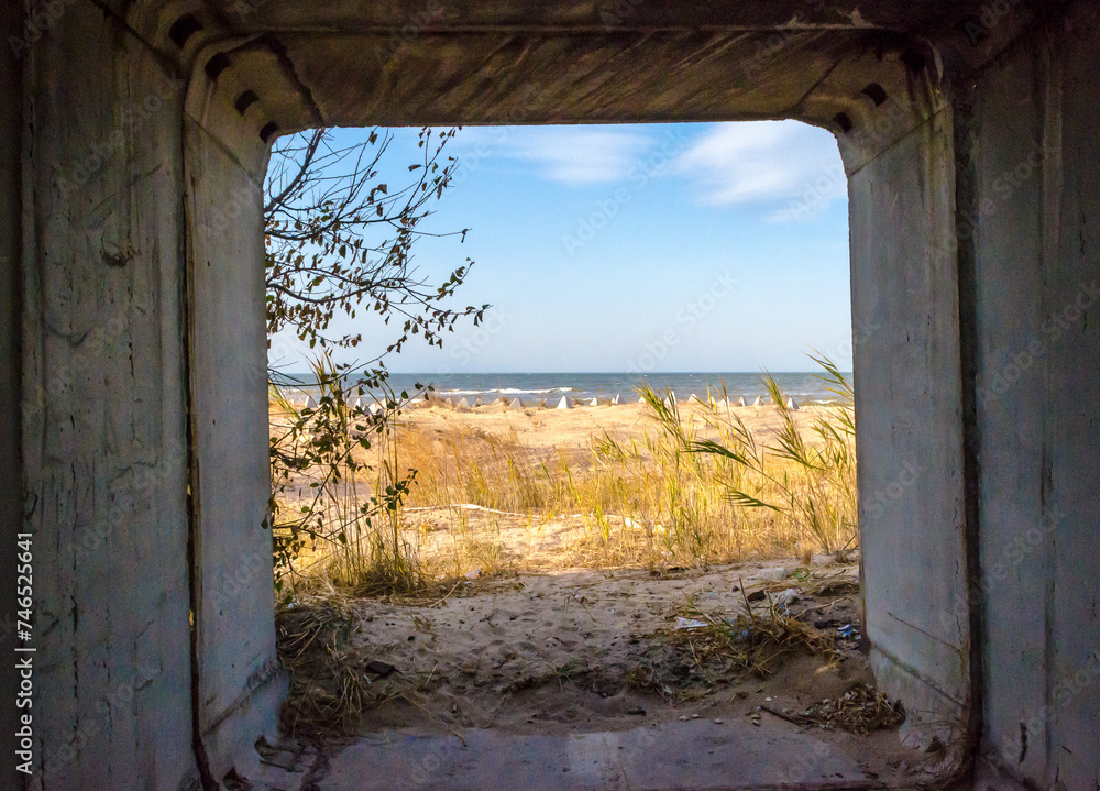 war in Ukraine view of the coast from concrete fortifications