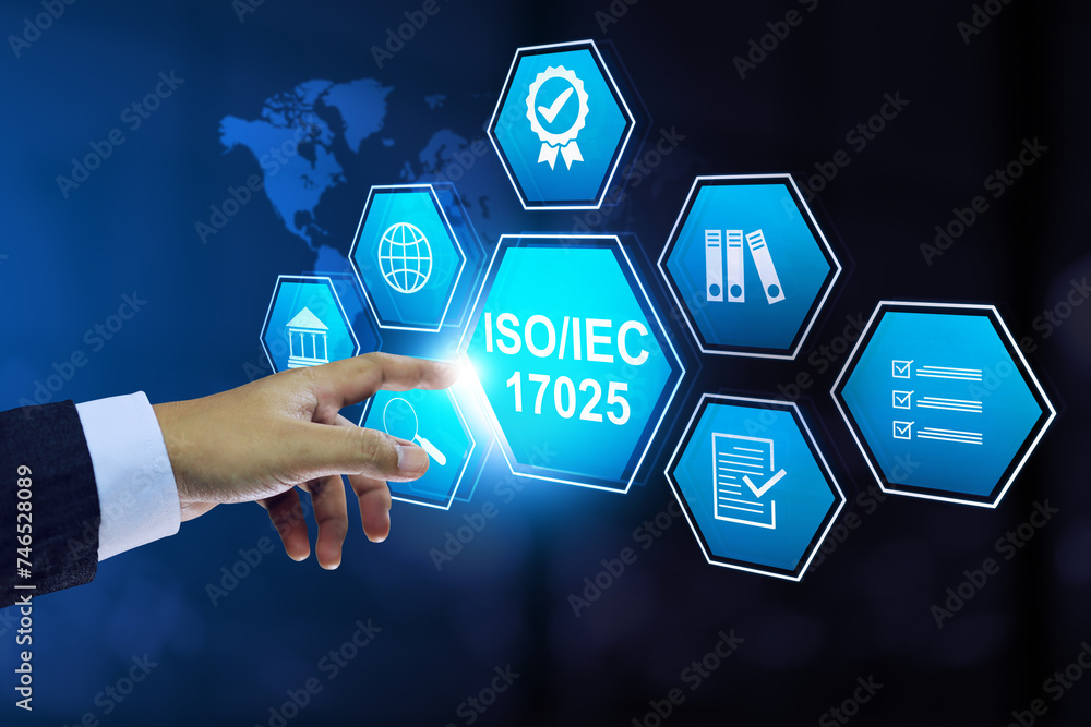 Businessman pointing on ISO IEC 17025 Laboratory management System for testing and calibration laboratory quality assurance certified body to approve result for industrial or factory certificates Businessman pointing on ISO IEC 17025 Laboratory management System for testing and calibration laboratory quality assurance certified body to approve result for industrial or factory certificates