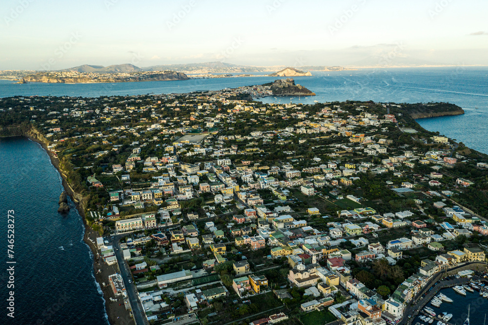 Fototapeta premium Procida,Italy - September 28 , 2019: characteristic houses of Procida with tourists and inhabitants - Italy
