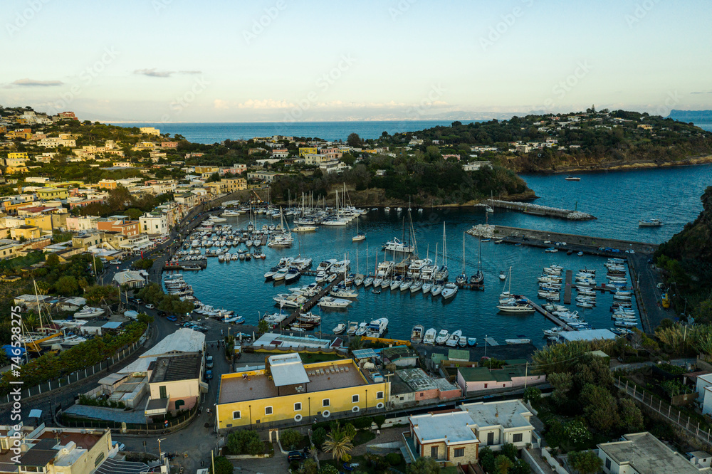Procida,Italy - September 28 , 2019: characteristic houses of Procida with tourists and inhabitants - Italy