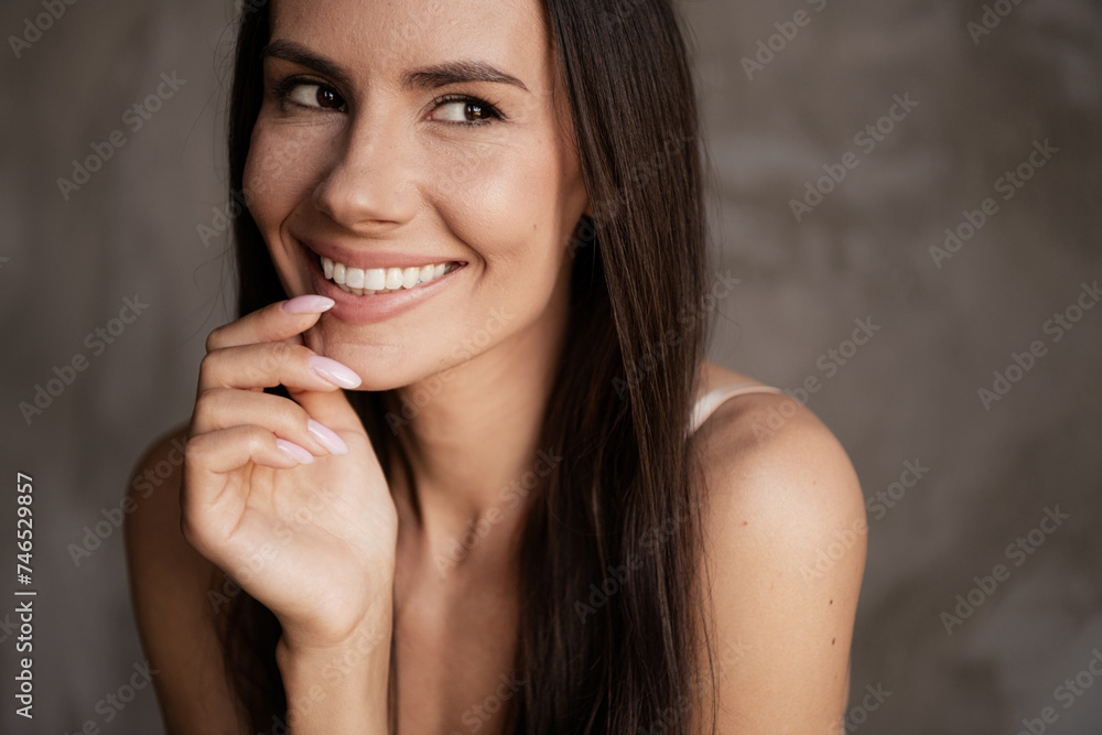 Close up photo no retouch of lovely adorable girl touch fingers lips thinking beauty advert isolated concrete grey color wall background Close up photo no retouch of lovely adorable girl touch fingers lips thinking beauty advert isolated concrete grey color wall background
