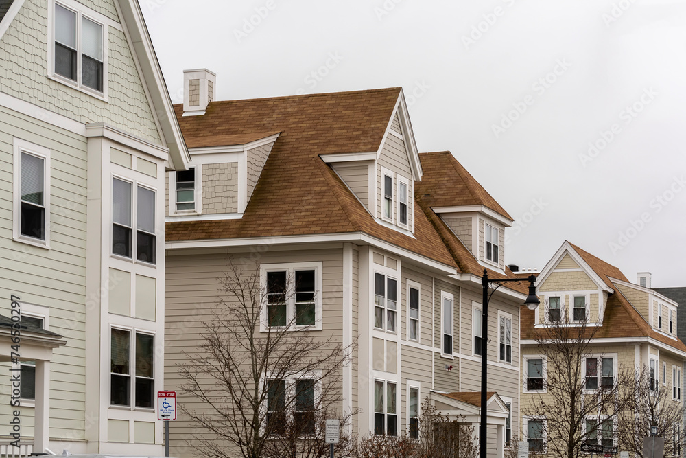 Newly built single-family houses on a winter day in Brighton, MA, USA Newly built single-family houses on a winter day in Brighton, MA, USA