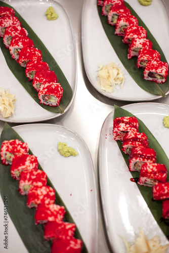 California sushi roll on a plate with decoration