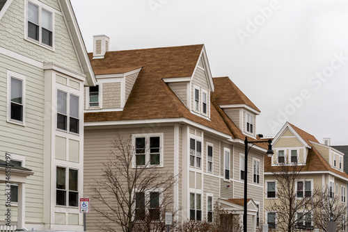 Newly built single-family houses on a winter day in Brighton, MA, USA