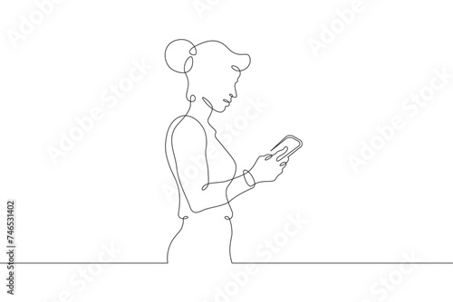 A woman stands with a phone in her hand. A man is talking on a smartphone.One continuous line . Line art. Minimal single line.White background. One line drawing.