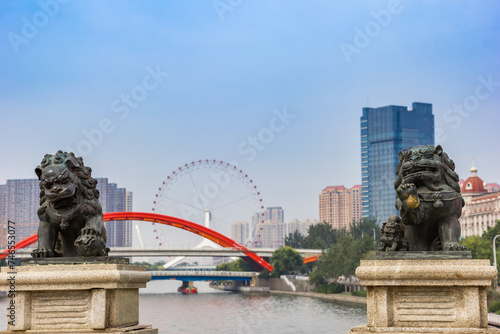 Lions on the Shizilin Bridge in Tianjin, China photo