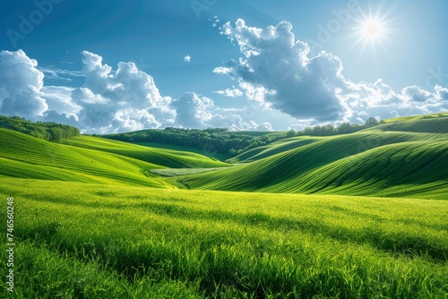 Breathtaking landscape of vibrant green hills under a clear sky with the sun radiating warmth and light