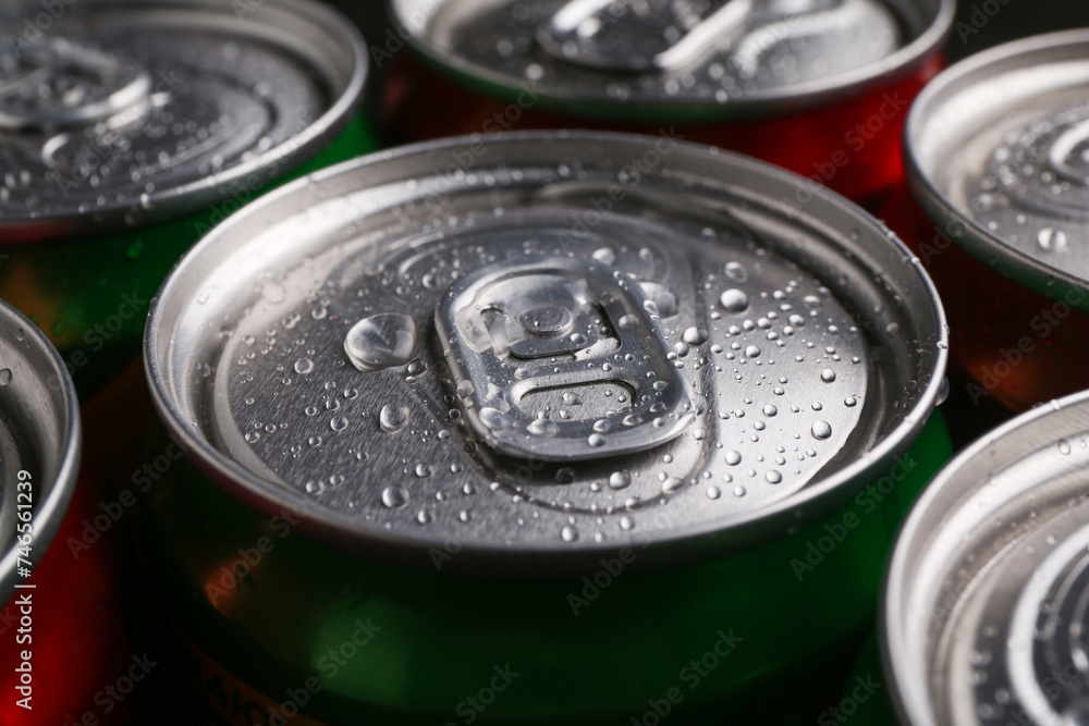 Energy drink in wet cans, closeup. Functional beverage Energy drink in wet cans, closeup. Functional beverage