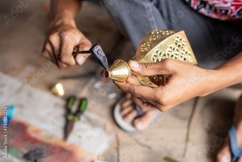 Craftsmen of traditional muslim lantern lamps in Cianjur are called 