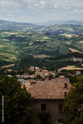 a breathtaking view from above of the houses and nature of San Marino