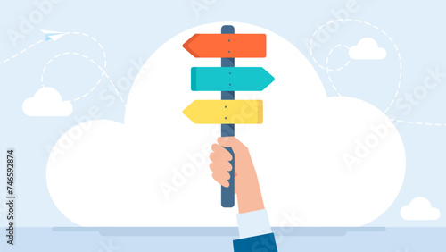 The hand holds an arrow pointing the direction of movement. The concept of choosing a business strategy. Direction road signs — arrows on blue sky. Vector illustration. photo