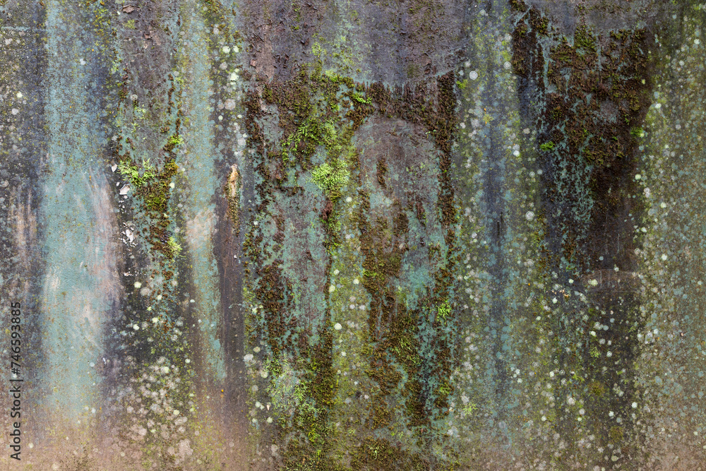 Concrete wall with moss and streaks of water in different shades of green, blue and gray Concrete wall with moss and streaks of water in different shades of green, blue and gray