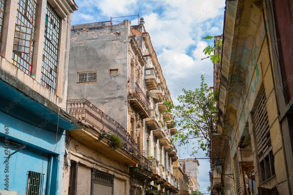 Historic buildings on Calle Muralla Street between Aguacate and Compostela Street in Old Havana (La Habana Vieja), Cuba. Old Havana is a World Heritage Site. 