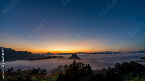 View of mountains with sea of mist in morning at Jabo village, Mae Hong Son, Thailand