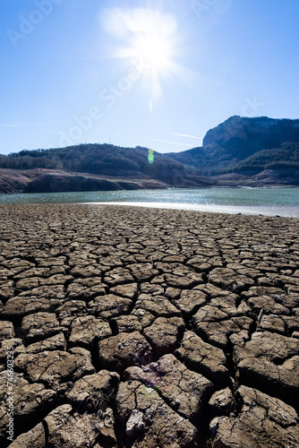 Lack water Sau Reservoir. The swamp is at very low water levels due to lack of rain. Desertification, climate change, environmental problems, drought. Barcelona, Spain