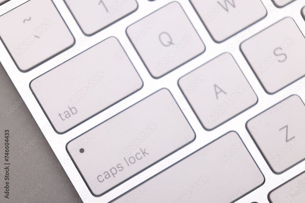 Internet shopping. Computer keyboard on grey background, top view Internet shopping. Computer keyboard on grey background, top view