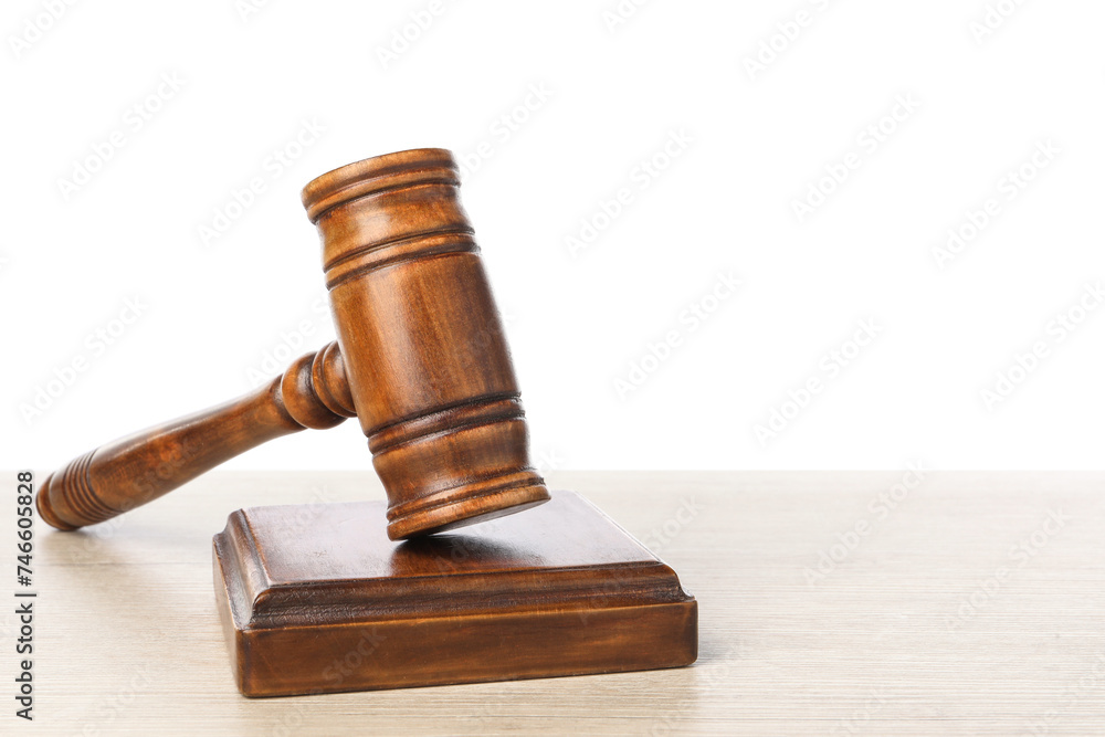 Wooden gavel on light table against white background. Space for text Wooden gavel on light table against white background. Space for text