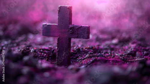 a cross in vibrant purple sand.