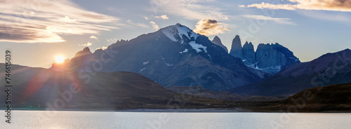 Majestic Sunrise over Patagonian Mountains and Lake photo