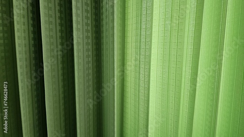 Dark and bright green curtain fabric background or textures