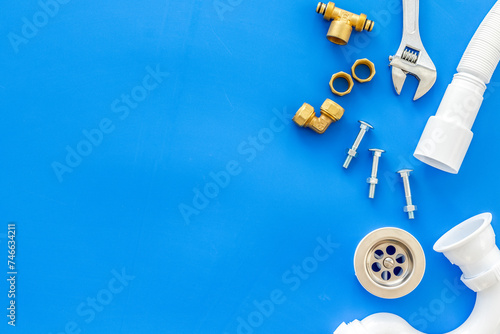 Plumber work with instruments, tools and gear on blue background top view mock up