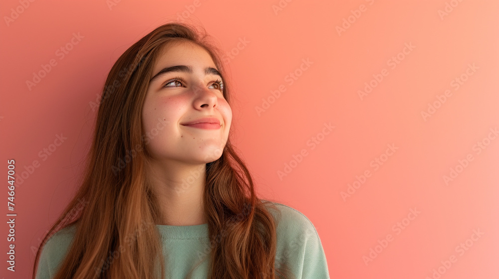 Hopeful Teen Spirit: Teenage Girl Expressing Hope and Optimism - Isolated on Solid Background with Copy Space Hopeful Teen Spirit: Teenage Girl Expressing Hope and Optimism - Isolated on Solid Background with Copy Space