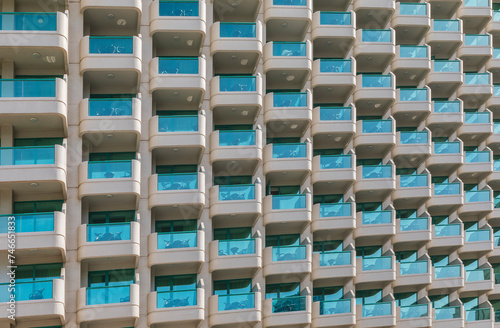 Glass balconies of the building. Architectural geometry