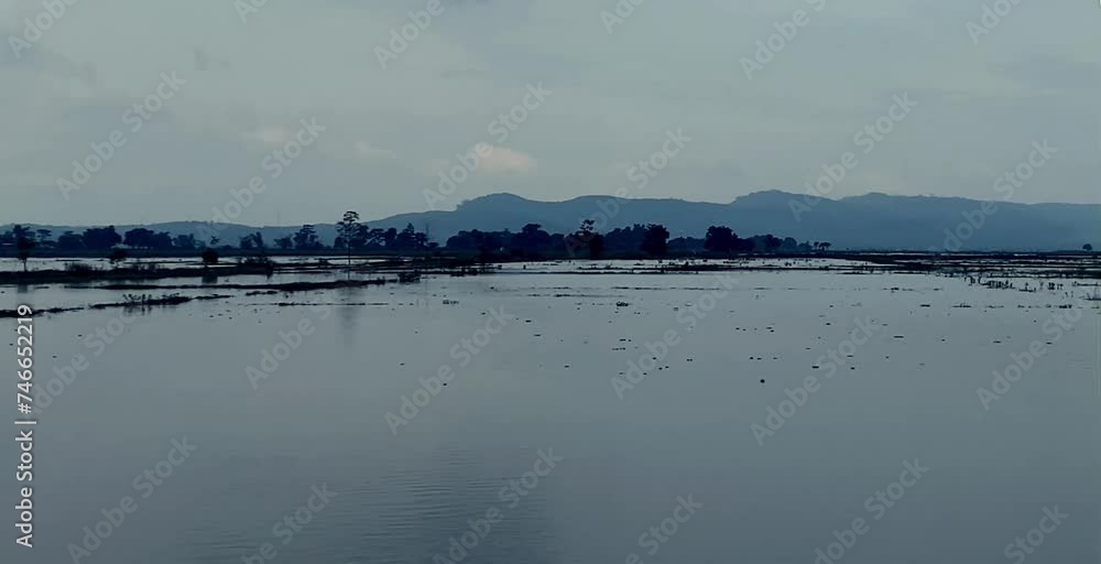 beautiful scenery where there is a wide and clear fresh water lake in the mountainous area beautiful scenery where there is a wide and clear fresh water lake in the mountainous area