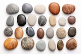 Various colored rocks displayed on a white background. Ideal for educational materials or geology related content
