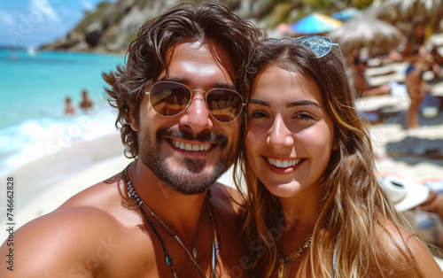 Beautiful adult couple while honeymoon on tropical beach.