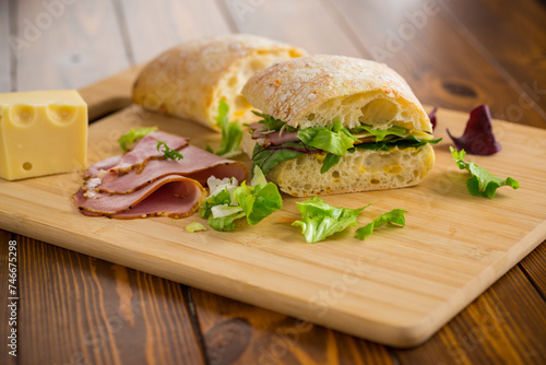 sandwich with sausage and herbs