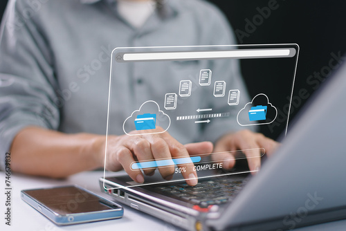 Internet cloud technology concept. Download data exchange. Transfer business folder data system relocation. Man use computer laptop waiting transfer file migration process, loading bar icon on screen. photo