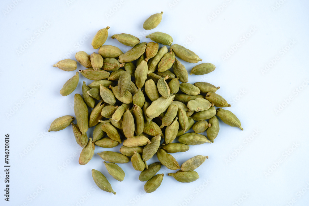 Small pile of green cardamom concept background Small pile of green cardamom concept background