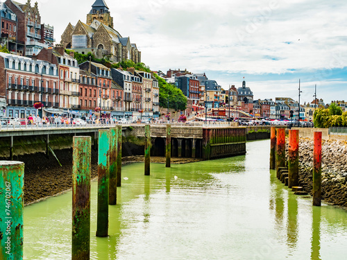 Scenic view of Le Treport al low tide, a traditional fishing village with colorful houses in Normandy, Northern France
