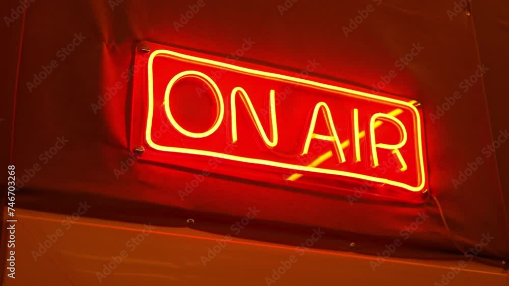 Bright red neon sign that reads Bright red neon sign that reads