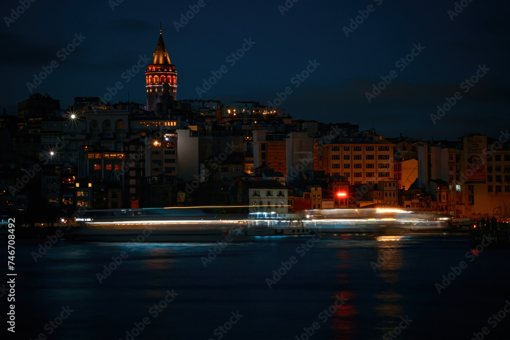 Istanbul skyline with Galata Tower at night.
