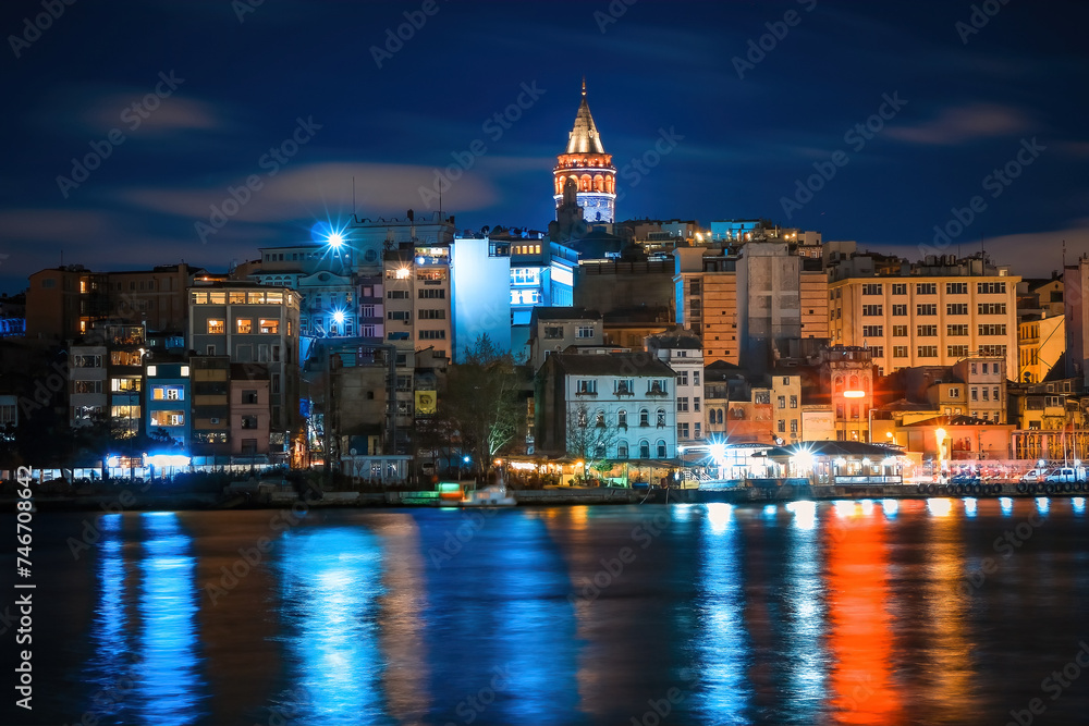 Istanbul skyline with Galata Tower at night.