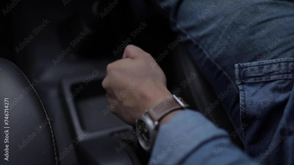 Driver release the car handbrake Driver release the car handbrake