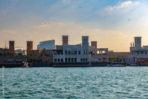 Contrast of Ancient Wind Towers and Modern Construction at Dubai Creek