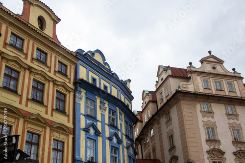 Colorful houses in the old historical part of Prague against the background of clouds