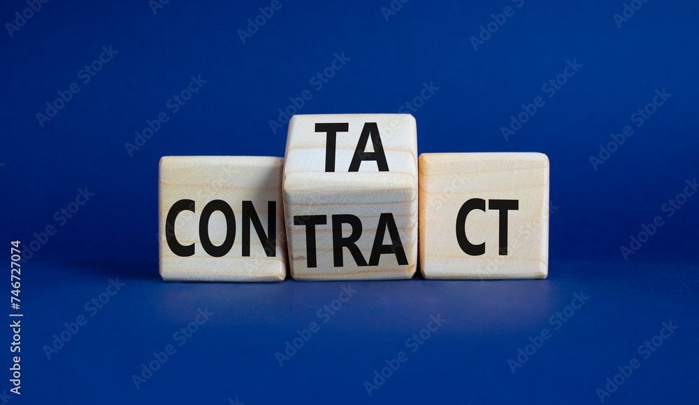 Contact and Contract symbol. Wooden cubes with words Contract and Contact. Beautiful deep blue background. Contact and Contract and business concept. Copy space Contact and Contract symbol. Wooden cubes with words Contract and Contact. Beautiful deep blue background. Contact and Contract and business concept. Copy space