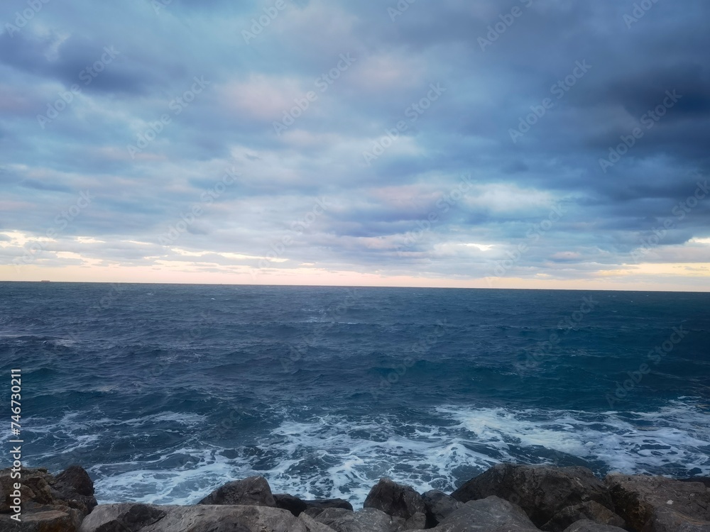 Serenity Before the Storm - The Tapestry of Ocean and Clouds