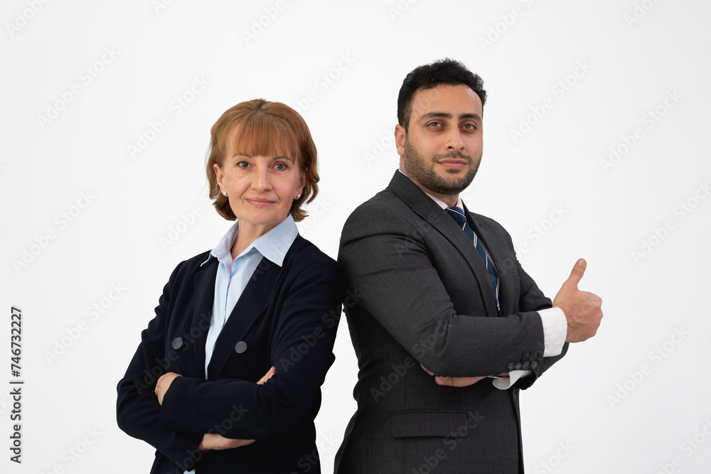 Two cheerful business professionals giving thumbs up in a sign of success or agreement, isolated on white background.. Two cheerful business professionals giving thumbs up in a sign of success or agreement, isolated on white background..