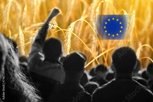 Farmers protest in Europe. EU flag, wheat and people background photo